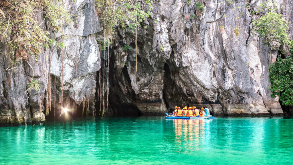 Puerto Princesa Subterranean River -taking a boat tour through its 8.2-kilometer-long underground river system