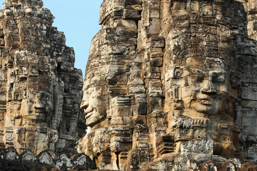 Bayon temple faces at Angkor in late-afternoon light