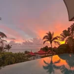 Infinity pool sunset view over the Gulf of Thailand at a luxury Koh Samui resort — Discovery DMC Thailand travel designer for travel advisors