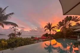 Infinity pool sunset view over the Gulf of Thailand at a luxury Koh Samui resort — Discovery DMC Thailand travel designer for travel advisors