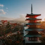 A breathtaking sunset view of Chureito Pagoda and Mount Fuji in autumn, showcasing exclusive experiences curated by a premier Japan DMC for luxury travelers.