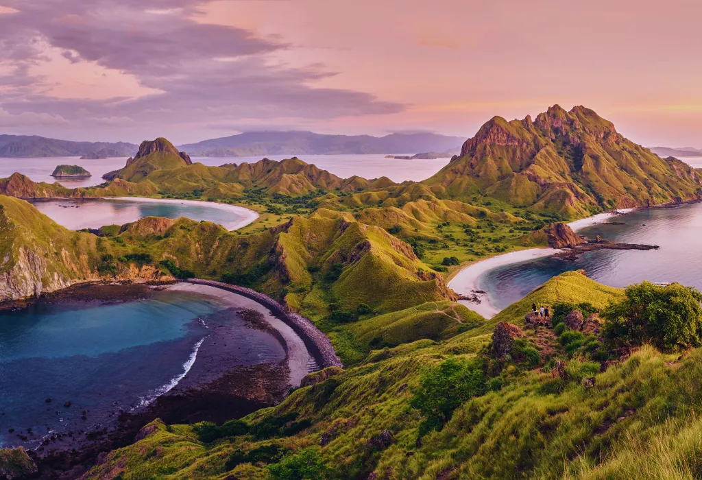 Komodo National Park Padar Island viewpoint at sunset, showcasing hills and three crescent beaches. Perfect for luxury Indonesia travel and bespoke Indonesia tours and holidays.