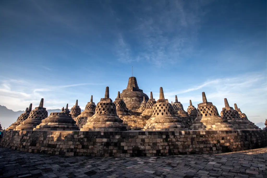 Sunrise over the iconic Borobudur Temple stupas