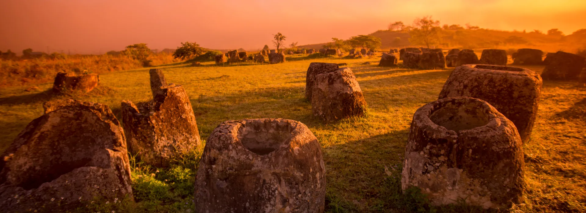 Experience the mystique of Laos with our luxury travel packages to the Plain of Jars in Phonsavan, an ancient archaeological site offering unique cultural exploration.