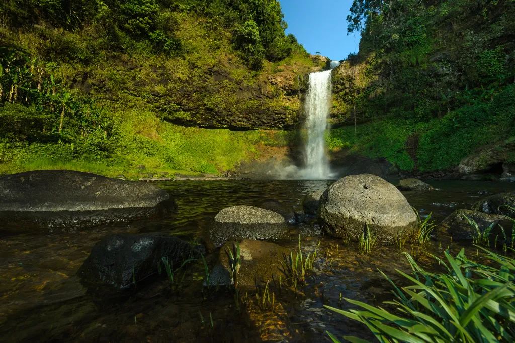 Stunning waterfall in the Bolaven Plateau near Pakse, Laos, highlighting pristine natural beauty for luxury adventure travel and exclusive group excursions.