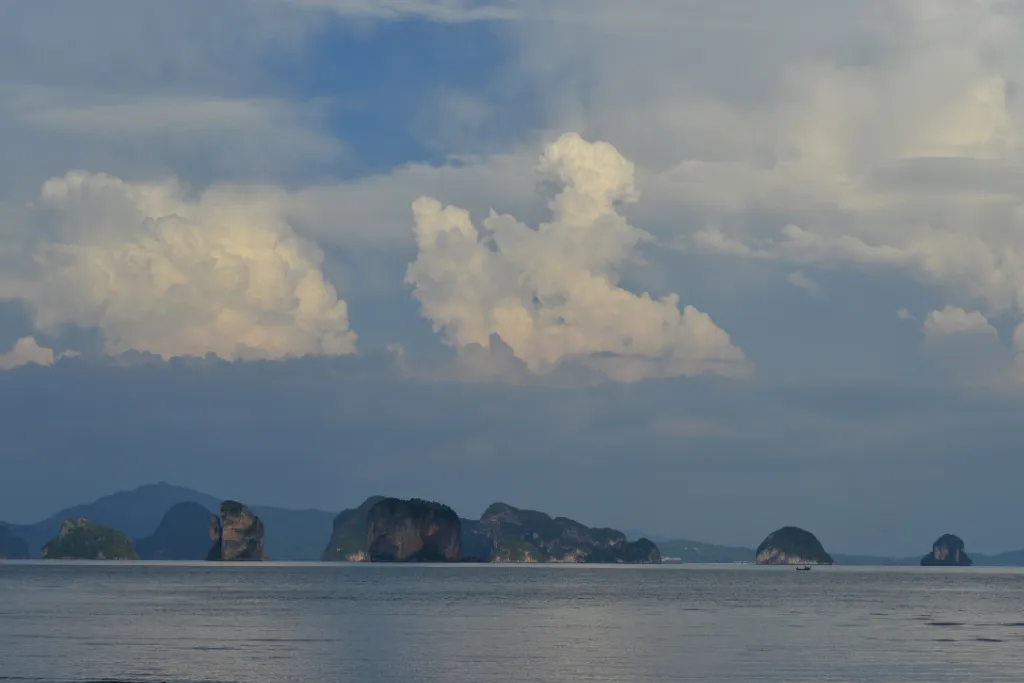 A unique MICE and DMC destination in Thailand, featuring a vast low-tide beach with a winding stream of water and majestic limestone karsts, ideal for an adventurous corporate event or team-building experience.