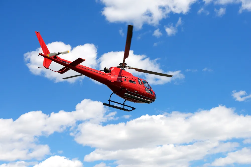 A scenic helicopter tour over Angkor Wat, offering a unique aerial view of the ancient temples in Cambodia.