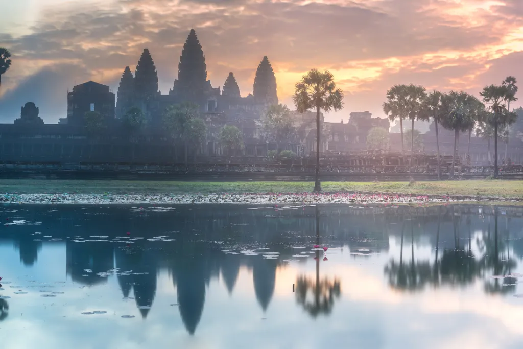 Stunning Angkor Wat sunrise reflected in the moat, perfect for luxury Cambodia tours and Cambodia holidays. Book bespoke Cambodia travel experiences with a trusted Cambodia DMC.