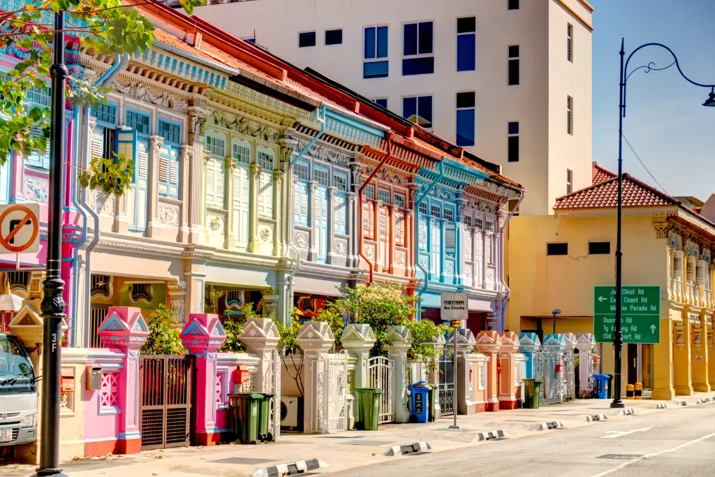 Vibrant, colorful Peranakan shophouses architecture. Discover the rich culture of Singapore and Malaysia with our luxury DMC services and bespoke Malaysia tours.