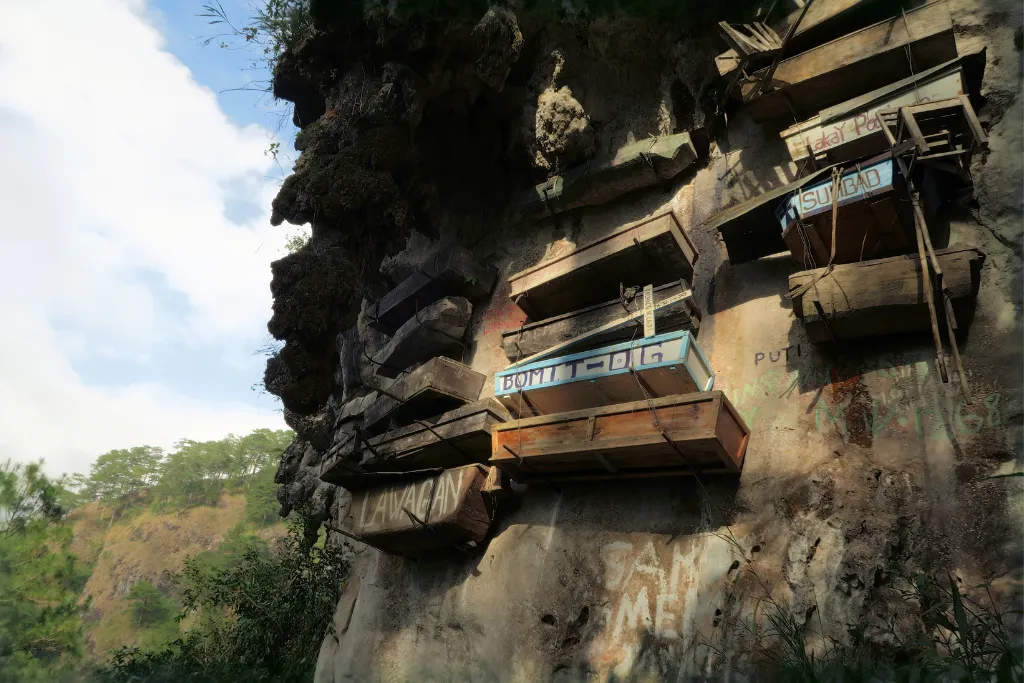 The historic Hanging Coffins of Sagada, Mountain Province, Philippines. A fascinating stop on cultural and adventure tours showcasing unique Philippines travel and heritage.